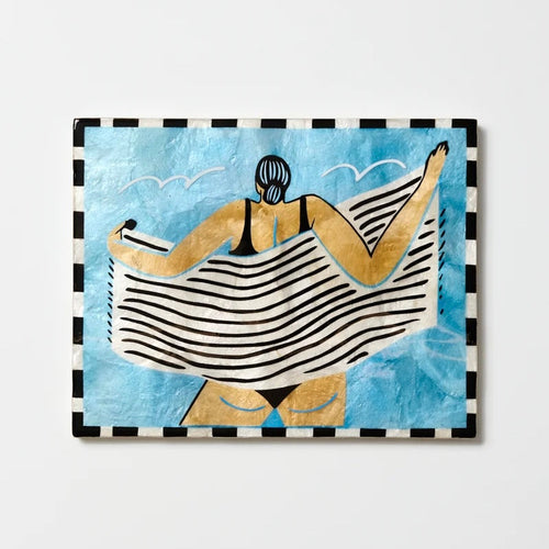 jones & co beach day wall art towel off, hand-painted capiz figure with striped towel on blue background