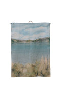 cc interiors island summer linen tea towel with scenic landscape print in teal and green tones