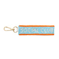 Beaded key chain with floral pattern on a white background
