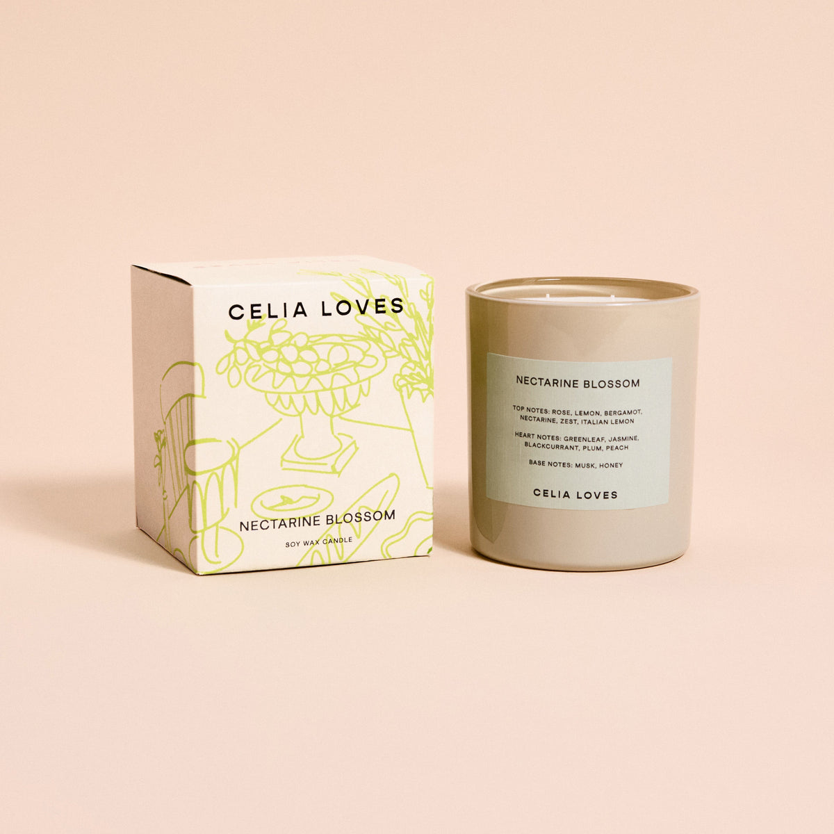 Celia Loves Nectarine Blossom soy candle in beige glass vessel with illustrated gift box