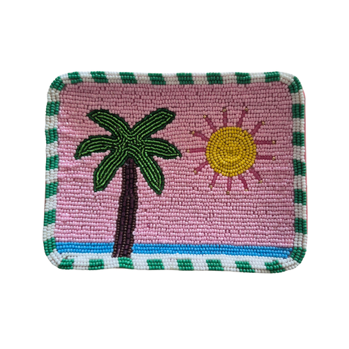 zoda beaded tray with palm tree and sun design in pink green and yellow